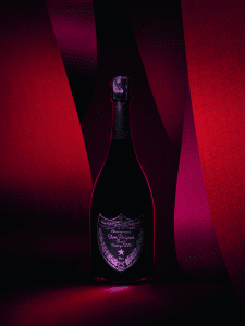 dom perignon vintage rose 2006 bottle surrounding by blush colors
