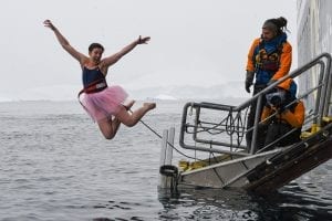 Jet Linx safety specialist jump into ocean while supporting The Tutu Project