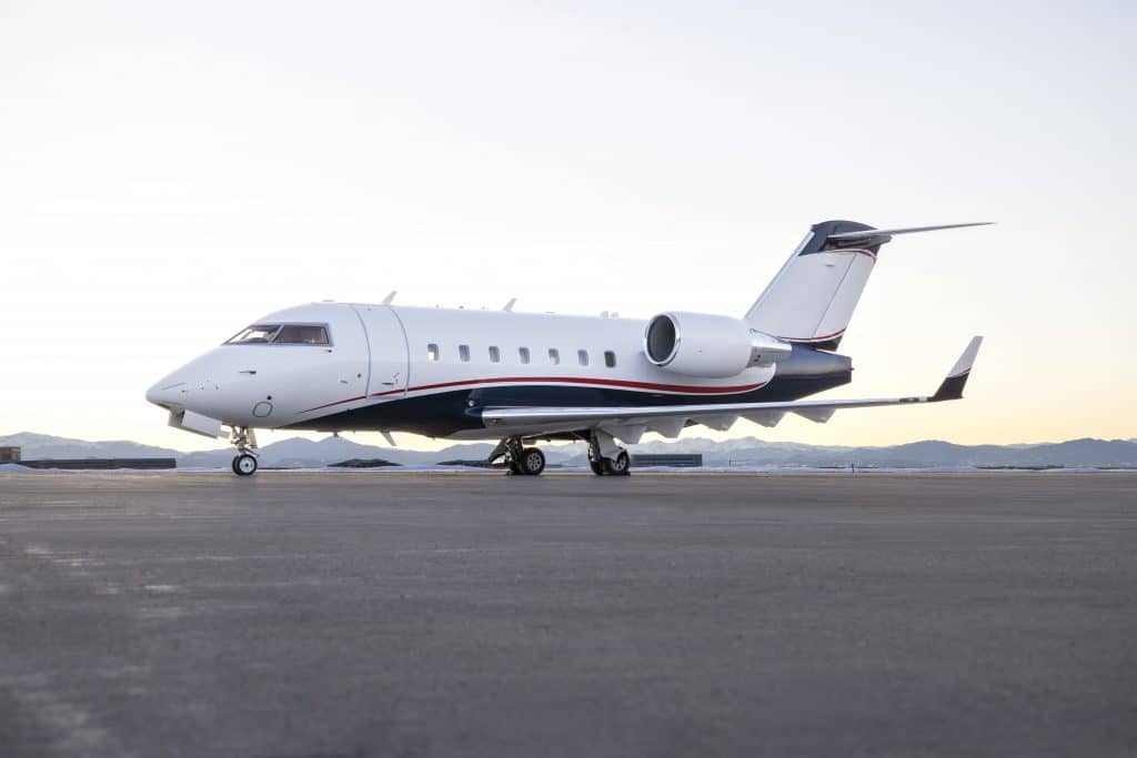 Exterior of Challenger 604 Heavy private jet on runway